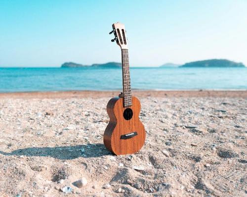 Cover art for 'Happy Ukulele Loop' royalty-free music track – ideal for videos, presentations, commercials, and marketing